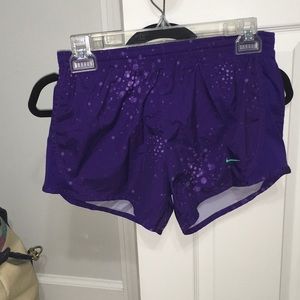Purple Nike shorts